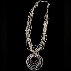 Elegant Multi-Strand Necklace with Silver and Gold Rings